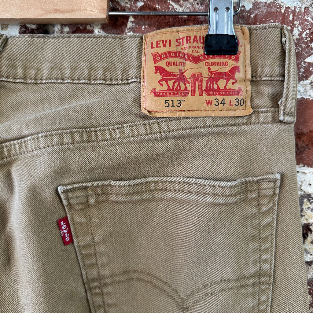 Levis 513 Jeans Mens 34x30 Brown Tan Slim Straight Leg Denim (measures 35x28.5)